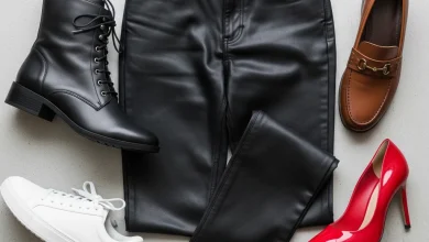 A flat-lay showing what shoes to wear with black leather pants, featuring four options: black combat boots, white sneakers, brown loafers, and red pumps.